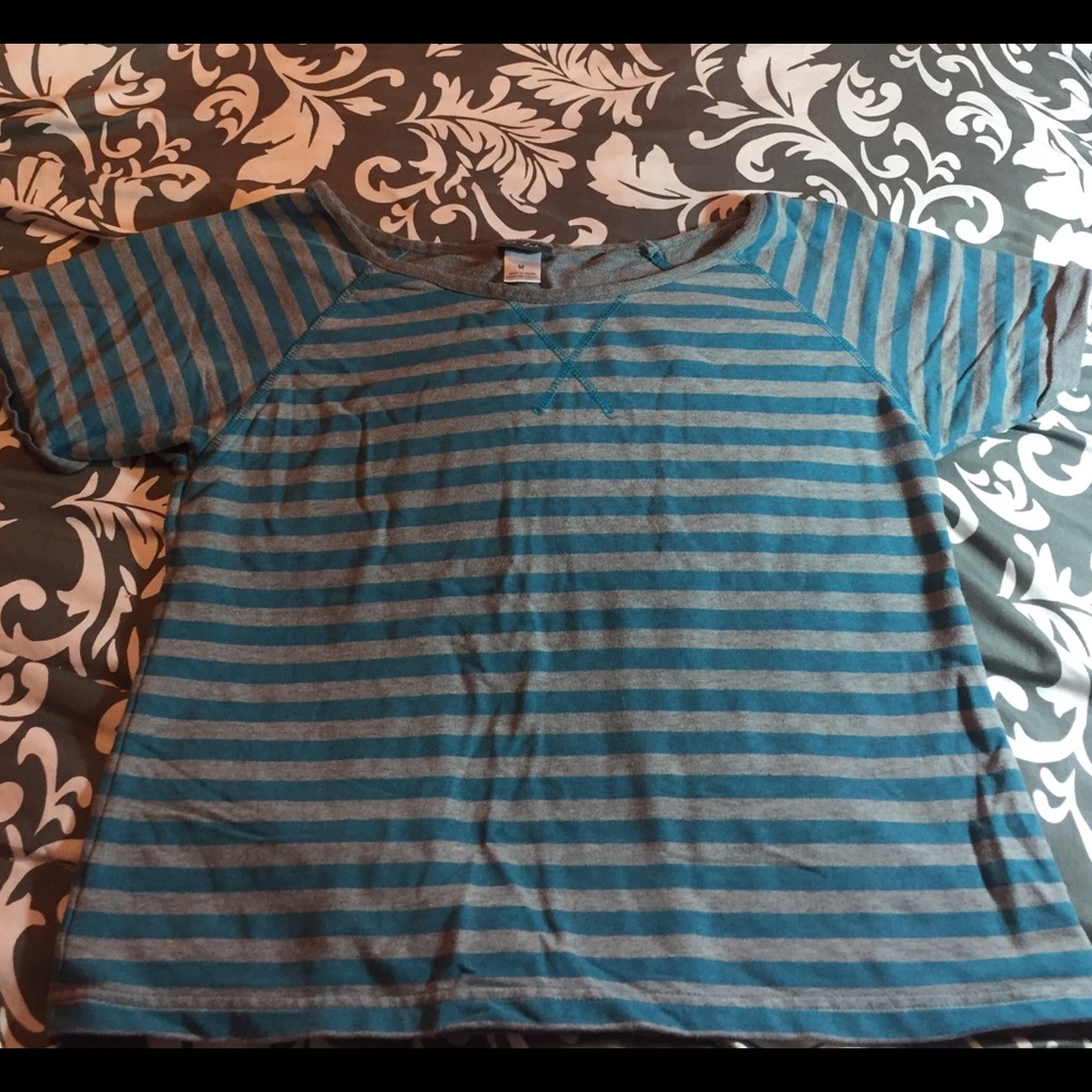 Turquoise and grey striped, longer crop top.